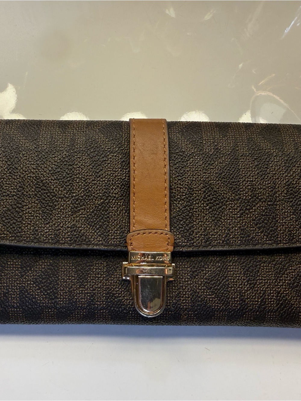 Michael Kors Dark Brown Monogram Clutch Wallet with Tan Strap